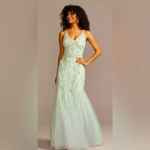 XSCAPE
beaded v-neck mermaid gown with tulle godets